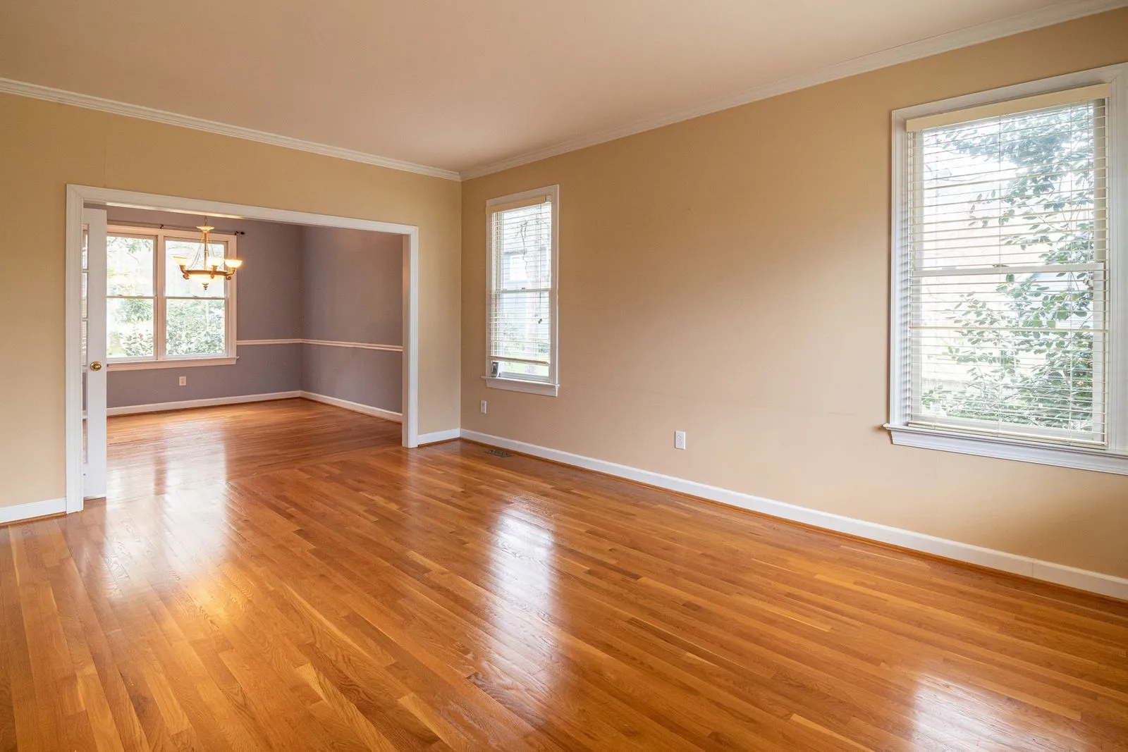 Sunlit room with freshly refinished oak hardwood floors